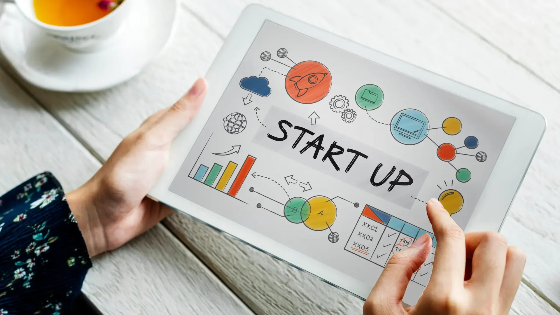 person-using-tablet-scaled